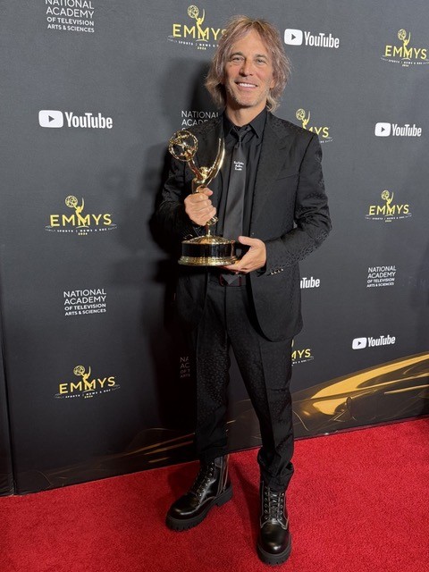Nathan Ross at the 2026 News & Documentary Emmy Awards holding his Emmy for Critical Incident: Death at the Border